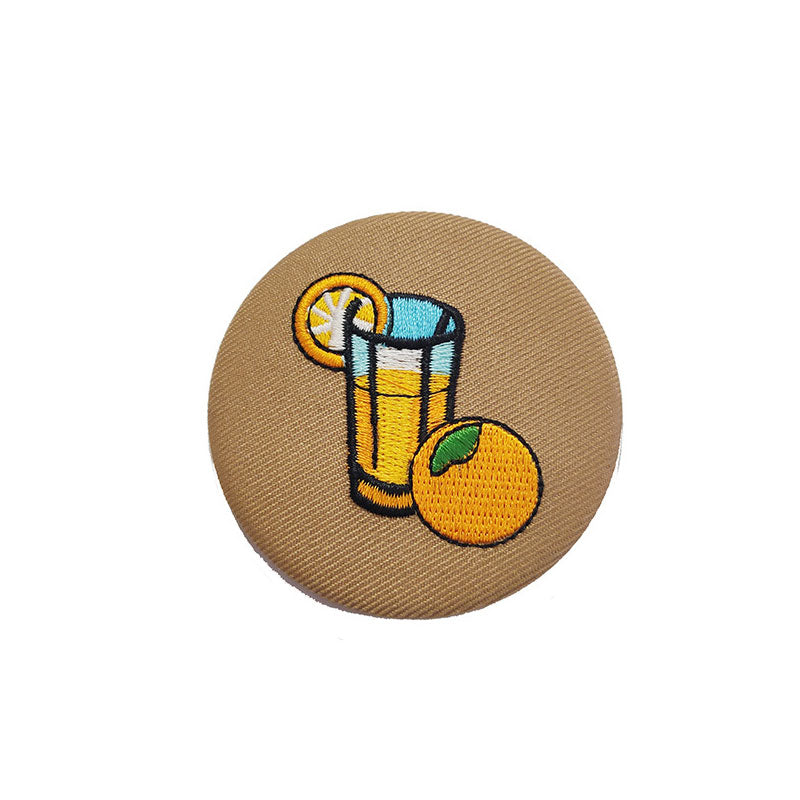 Insignia de botón bordada